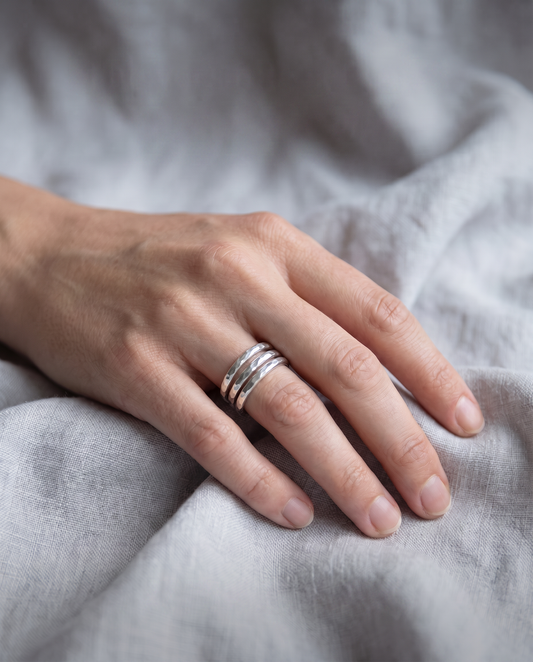 ARGENTIUM SILVER HAMMERED STACKING BAND RINGS - SET OF THREE